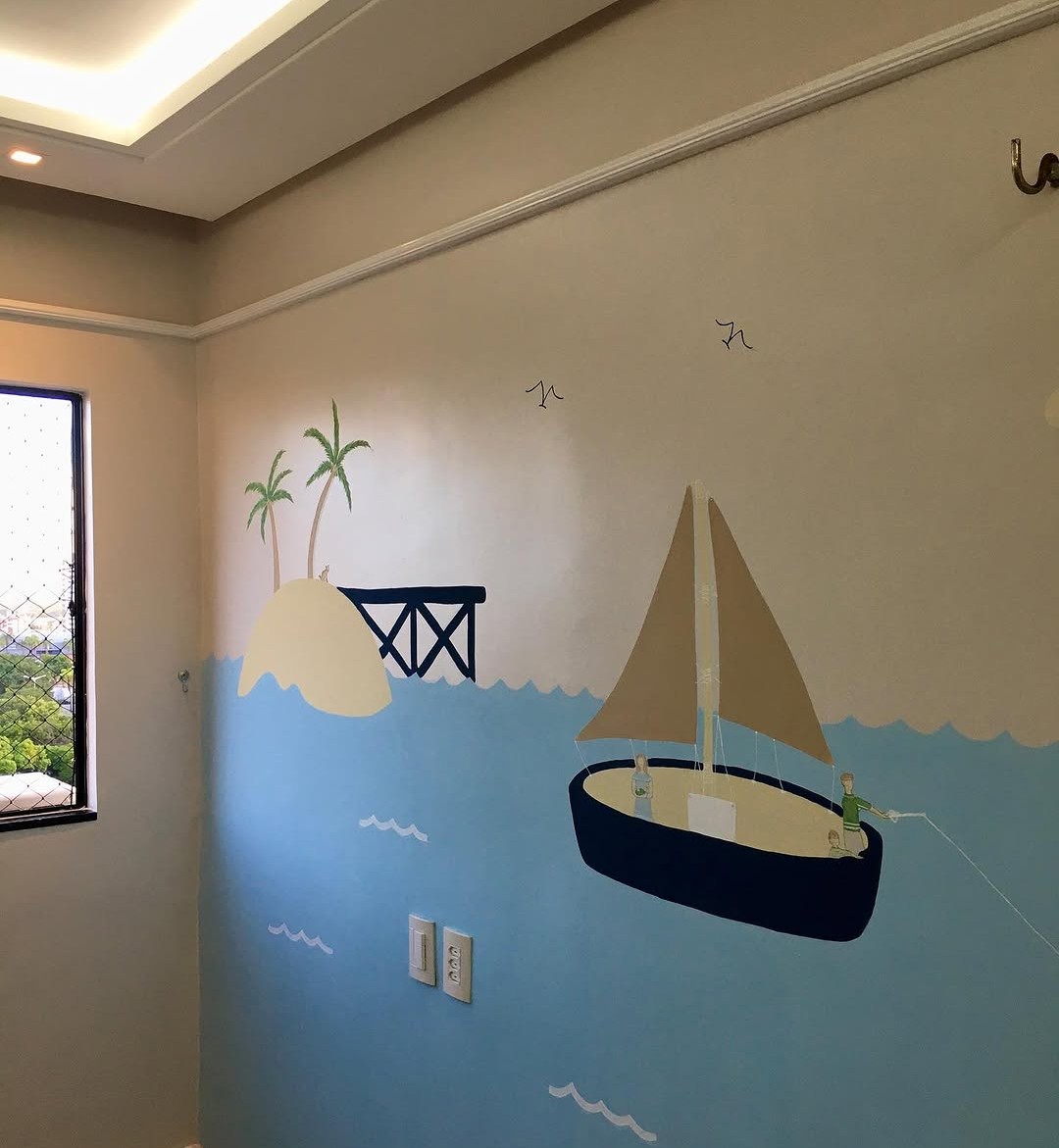 Mural náutico com veleiro em quarto infantil